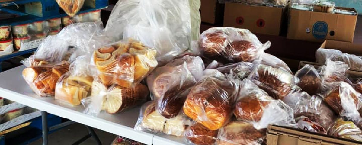 Woman sorts bread