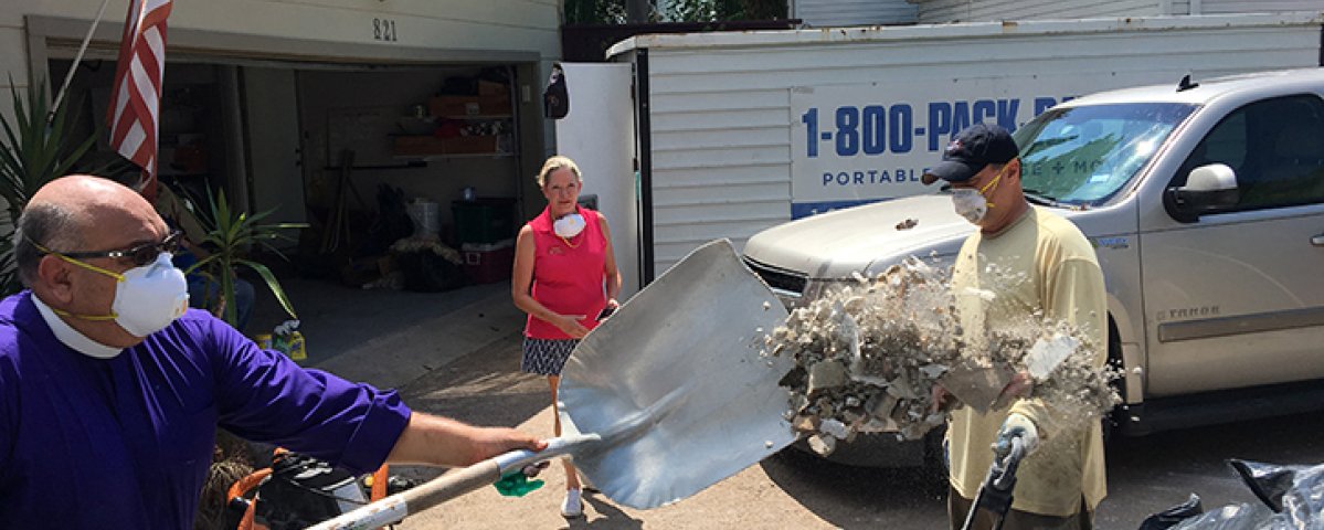 Bishop and communities members assist in community clean up after Hurricane damage